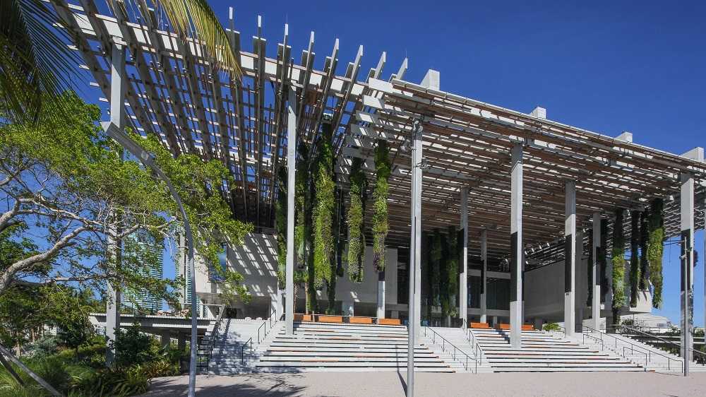 A contemporary structure featuring wooden construction and staircases in Miami nightlife attractions.