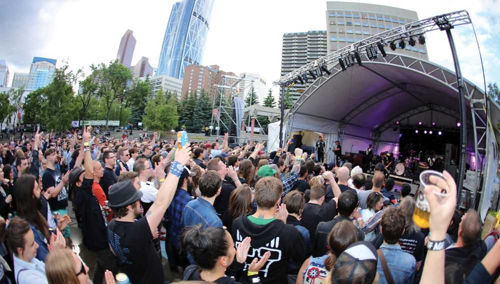 One of the best things to do in Calgary is to experience the exhilarating atmosphere of a crowd at an outdoor concert.