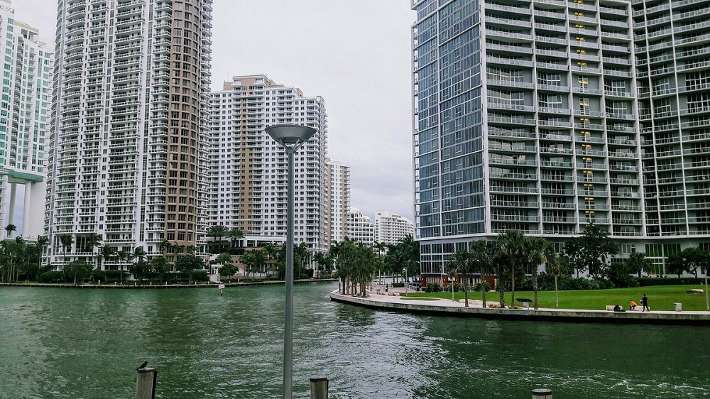 A river bordered by tall buildings in Downtown Miami.