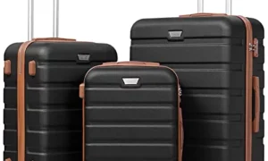 Three pieces of luggage with wheels on a white background.