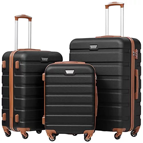 Three pieces of luggage with wheels on a white background.