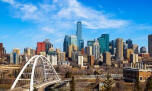 Explore the stunning skyline of Edmonton with a captivating bridge in the background.