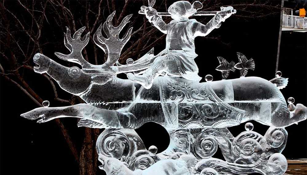 An ice sculpture of a man riding a deer created for the festivals in Edmonton.