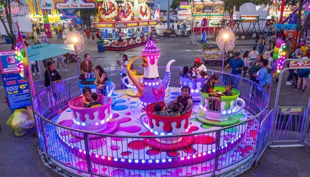 An amusement ride at a festivals in edmonton park.