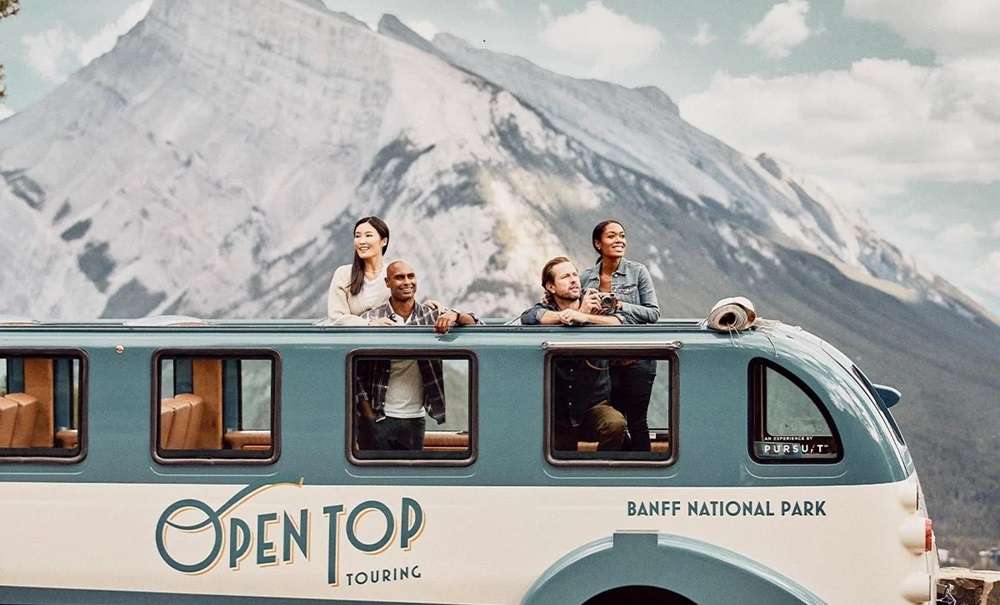 a group of people standing in a bus