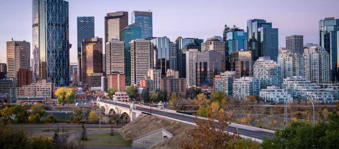 Alberta travel guide: The skyline of Calgary at sunset, an Alberta travel guide destination.